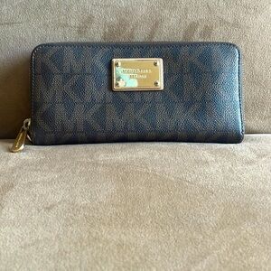 Very gently used monogramed Michael Kors wallet